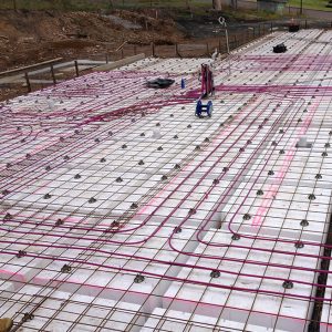 multi zone hydronic floor heating pipe and manifold in slab